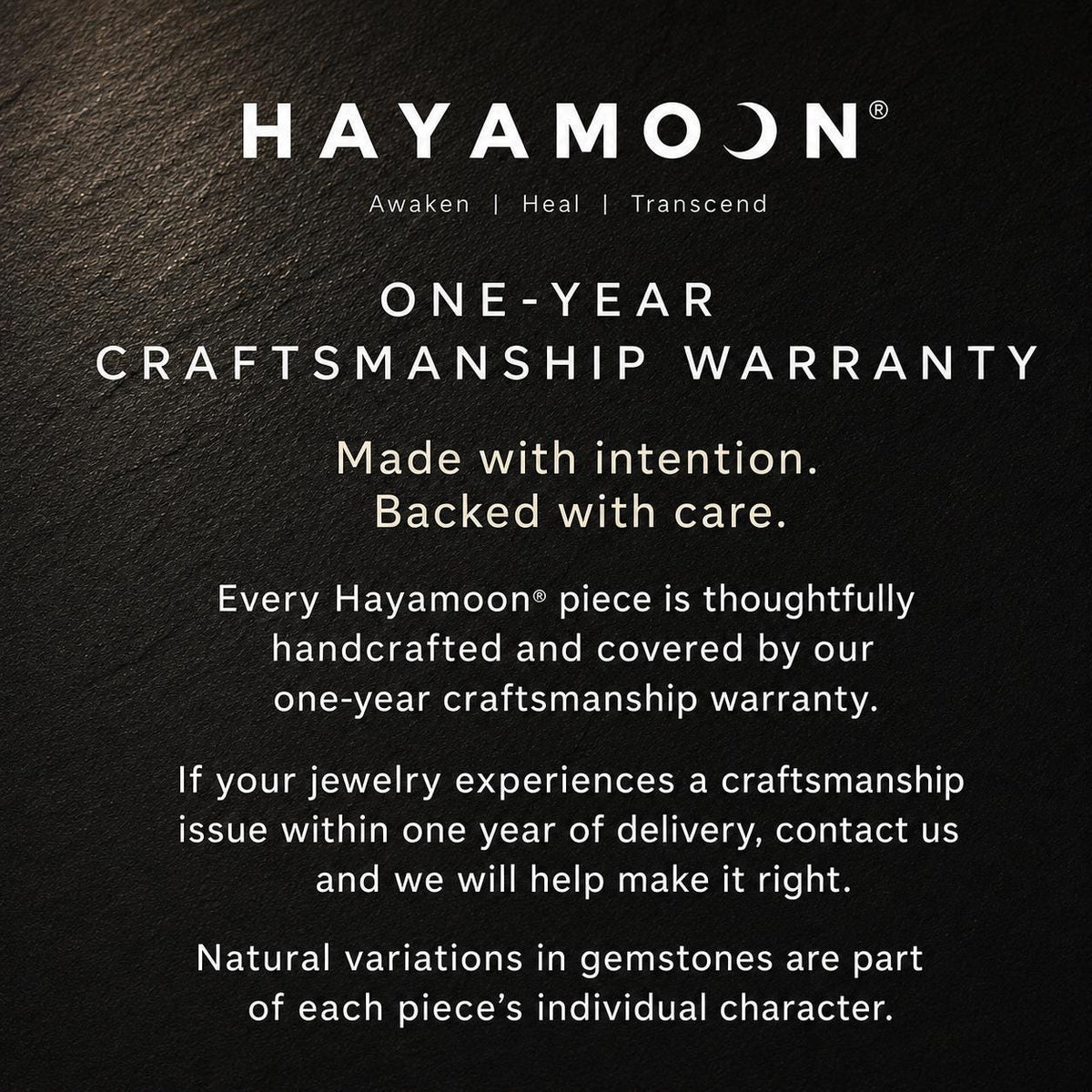 One-year craftsmanship warranty card on black textured background